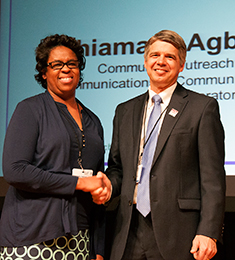 Chiamaka Agbasi-Porter accepted her Unsung Hero Award from Lincoln Laboratory Director Eric Evans