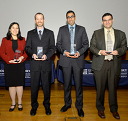 The inventors of Rapid and Precise Optically Multiplexed Imaging received Best Invention trophies. Seen here left to right are Tina Shih, Hamilton Shepard, Vinay Shah, and Yaron Rachlin. 