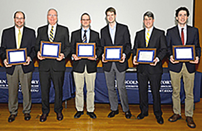 Shown with their Best Paper Award plaques are the authors of "Multi-Aperture Digital Coherent Combining for Next-Generation Optical Communication Receivers": from left to right, Scott Hamilton, Mark Stevens, Bryan Robinson, Curt Schieler, Timothy Yarnall, and David Geisler.
