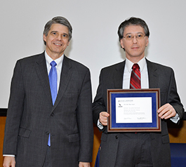 Dr. Peter Cho (right) accepted the 2012 MIT Lincoln Laboratory Best Paper Award from Director Evans. 