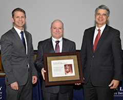 Left photo: Daniel O’Connor, center, is shown with Justin Brooke, left, head of the Air, Missile, and Maritime Defense Technology Division, who introduced Dr. O’Connor at the ceremony, and Eric Evans, director of Lincoln Laboratory, who presented Dr. O’Connor with his award.